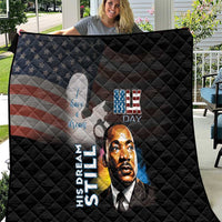 Black quilt with quilted pattern, MLK Day portrait, stars-and-stripes flag graphic
