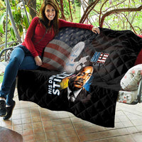 Black quilt on couch with quilted pattern, MLK Day portrait and stars-and-stripes