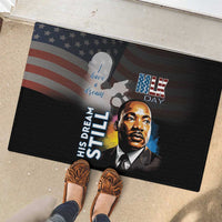 Black rubber doormat with MLK portrait, American flag design, and “MLK Day” text