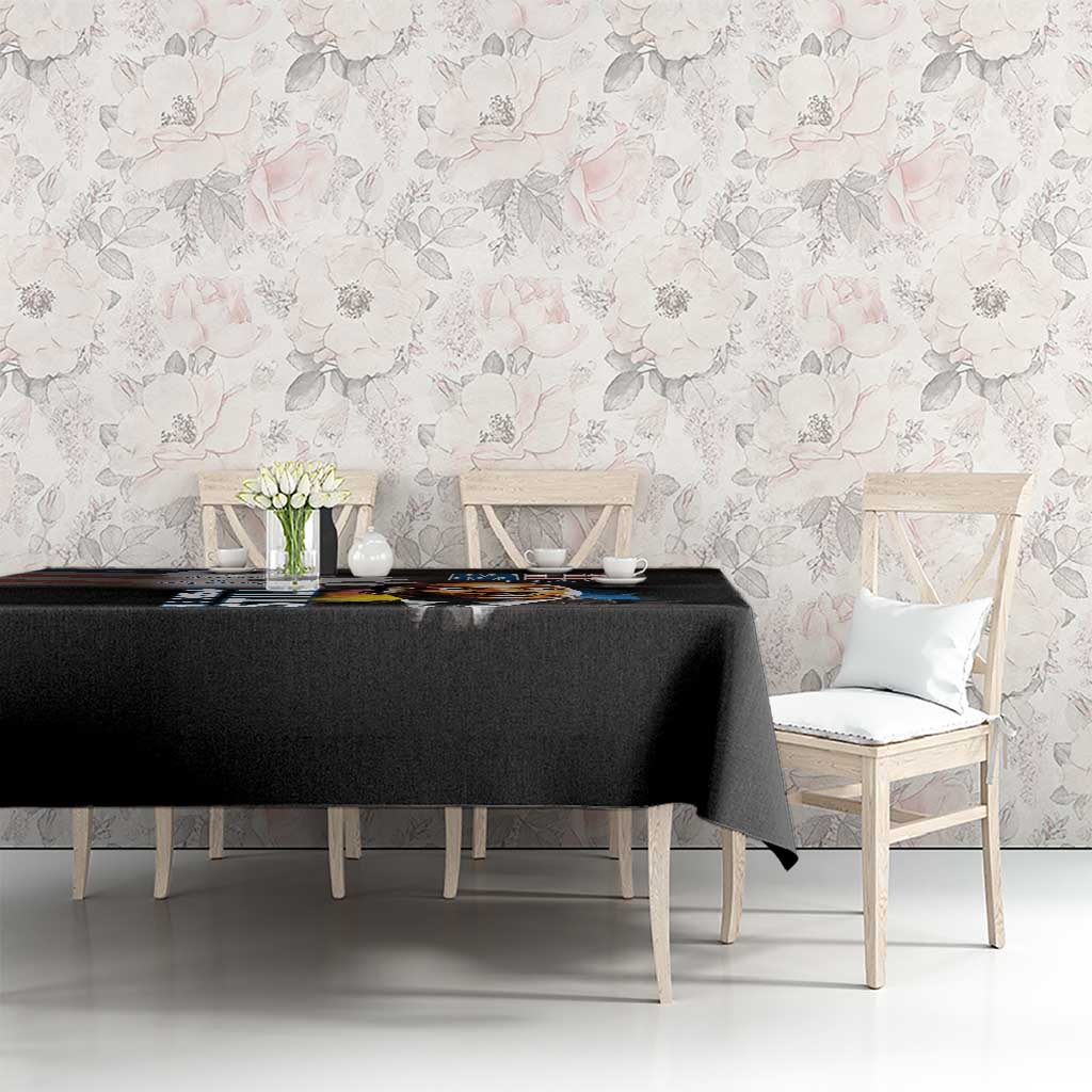 Black MLK Day tablecloth with Martin Luther King Jr portrait graphic over dining table