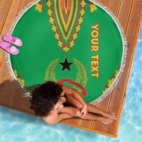 Green round beach blanket with white fringe, central dashiki design and 'YOUR TEXT' text