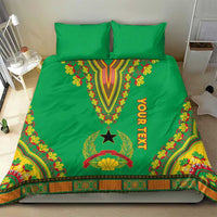 Green dashiki bedding set with Your Text ribbon, star motif, and ornamental border, centered on bed