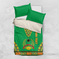 Green dashiki bedding set with folded duvet, Your Text ribbon and star motif, with two pillow covers