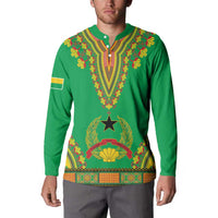 Green dashiki-style button sweatshirt on model, long sleeves with colorful leaf motif