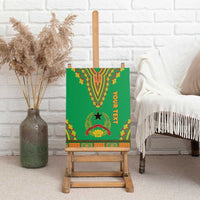 Green canvas wall art on a wooden easel with dashiki pattern and orange 'your text'.