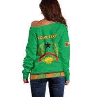 Green off-shoulder sweater back with custom text and star-and-laurel dashiki graphic