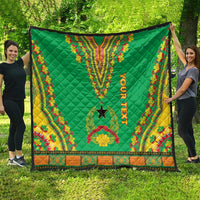 Green dashiki-style personalized quilt with “YOUR TEXT” and star, bright patterned edges