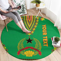 Round green carpet with colorful dashiki emblem, laurels, and vertical "YOUR TEXT"