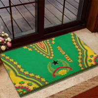 Green rubber doormat with colorful Dashiki trim, star graphic and 'YOUR TEXT' on step