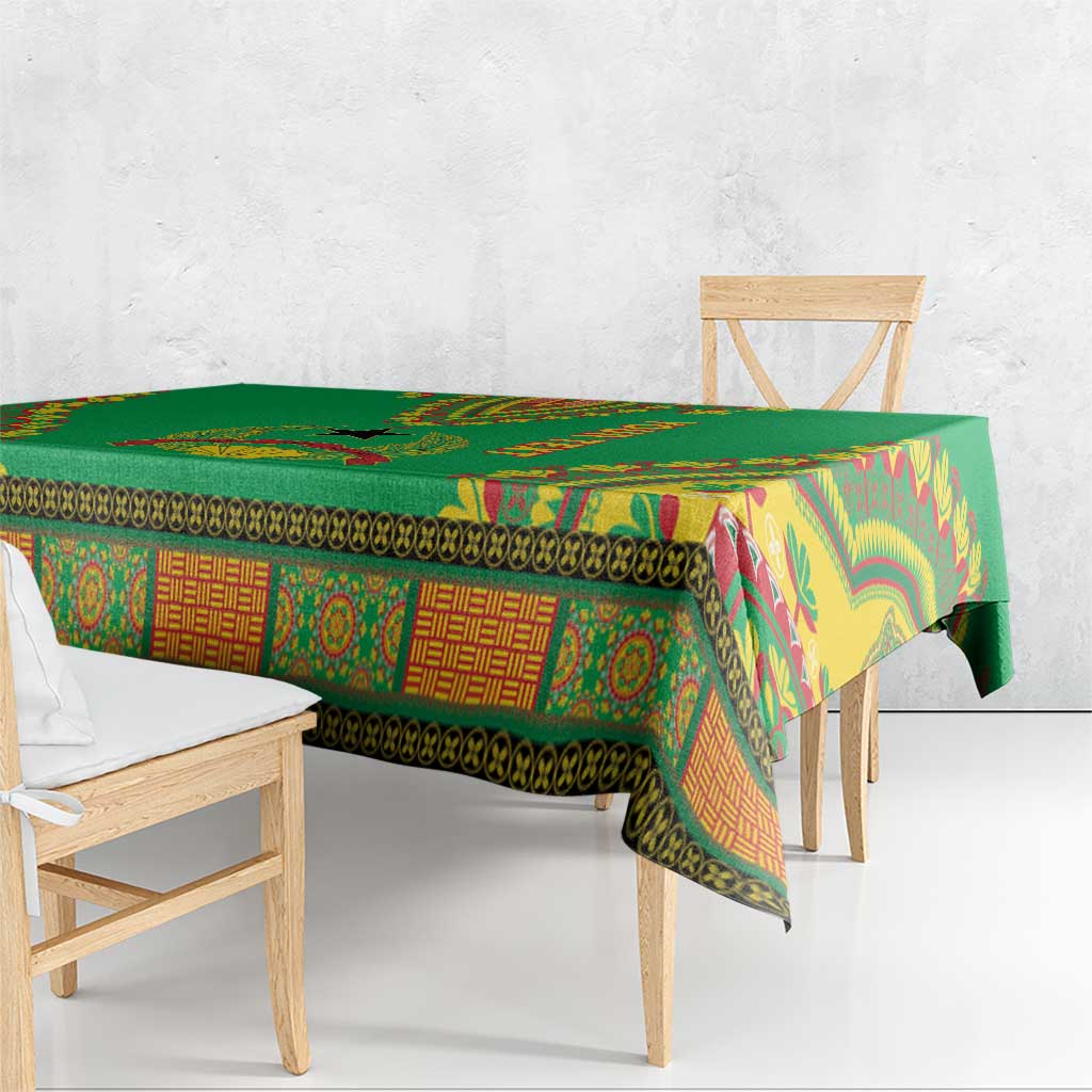 Personalised Guinea-Bissau tablecloth in green with vibrant geometric motifs and folded corner