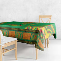 Personalised Guinea-Bissau tablecloth in green with vibrant geometric motifs and folded corner