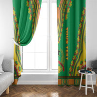 Green dashiki window curtains with 'YOUR TEXT' and multicolor border beside white door