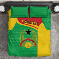Green and yellow bedding set with coat of arms emblem and custom text panel, includes pillows