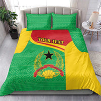 Green and yellow duvet set with coat of arms emblem and custom text panel, two matching pillows