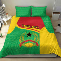 Green and yellow duvet with coat of arms emblem and custom text panel, with two pillows