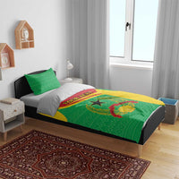 Green and yellow bedding set featuring coat of arms emblem and custom text panel on duvet