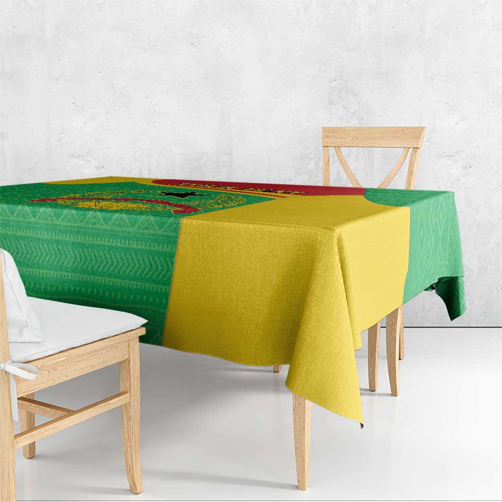 Personalised Guinea-Bissau tablecloth over bench, green geometric panel and yellow drop.
