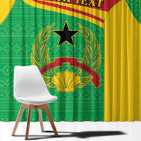 Close-up of green and yellow curtain panel with coat of arms, star and laurel