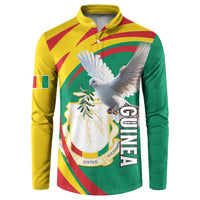 Green button sweatshirt with yellow collar, coat of arms graphic and white pigeon