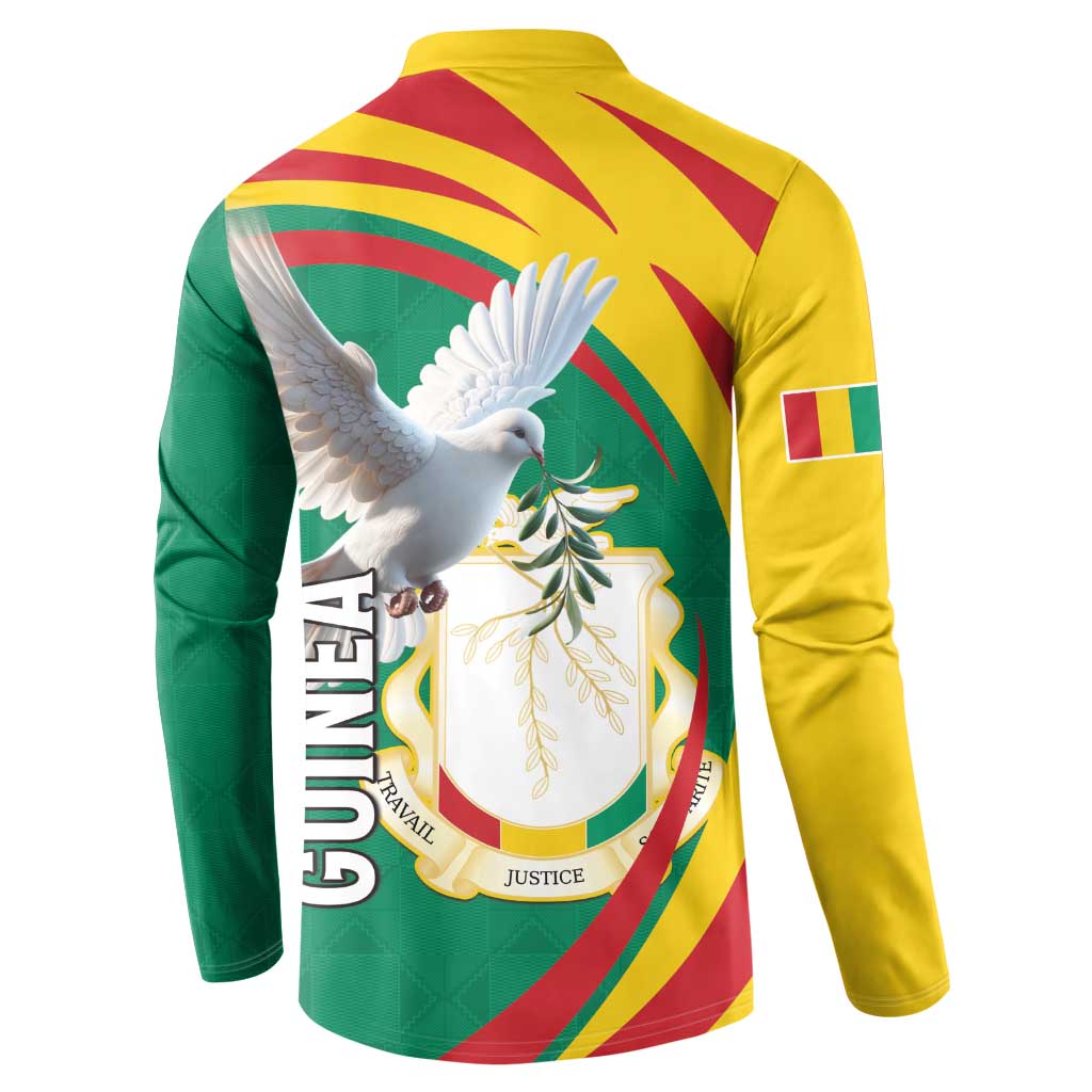 Back view green button sweatshirt with yellow shoulders, GUINEA text and pigeon graphic