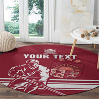 Red round hockey carpet with “YOUR TEXT” and player graphic on wooden floor