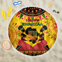 Round beach blanket with Happy Kwanzaa print, yellow orange colors, decorative fringe edge