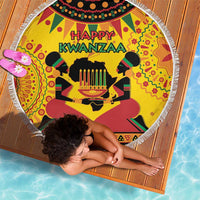 Round beach blanket with Happy Kwanzaa central scene and multicolor African pattern, fringe
