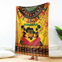 Orange Kwanzaa holiday blanket showing 'Happy Kwanzaa' and candle centerpiece art