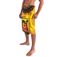 Orange-yellow African-pattern wrap sarong skirt with decorative band, side view