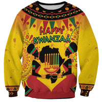 Orange unisex holiday sweatshirt with Happy Kwanzaa graphic and colorful African pattern