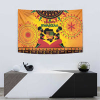 Orange 'Happy Kwanzaa' wall tapestry with colorful circular mandalas and kinara