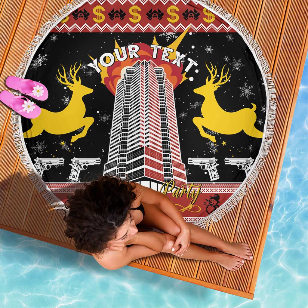 Round beach blanket with fringed edge, black holiday print with building, guns, and reindeer