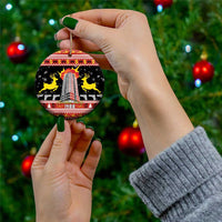 Black ceramic hanging ornament with gold loop, 1988 skyline tower and yellow horses