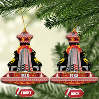 Black ceramic hanging ornament pair with gold loops; FRONT and BACK show 1988 tower
