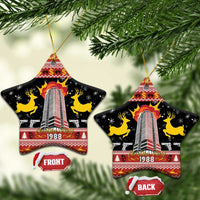 Black ceramic star ornament with gold loop; FRONT and BACK show 1988 skyline tower