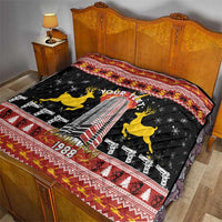 Personalized black quilted bedspread with yellow reindeer, rifles, red border, and 1988