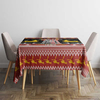 Black and red Christmas tablecloth with deer row and zigzag pattern on dining table