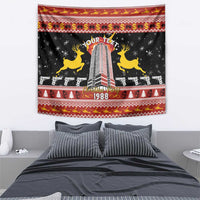 Rectangular black Christmas tapestry with tower, yellow reindeer, 'YOUR TEXT' and 1988