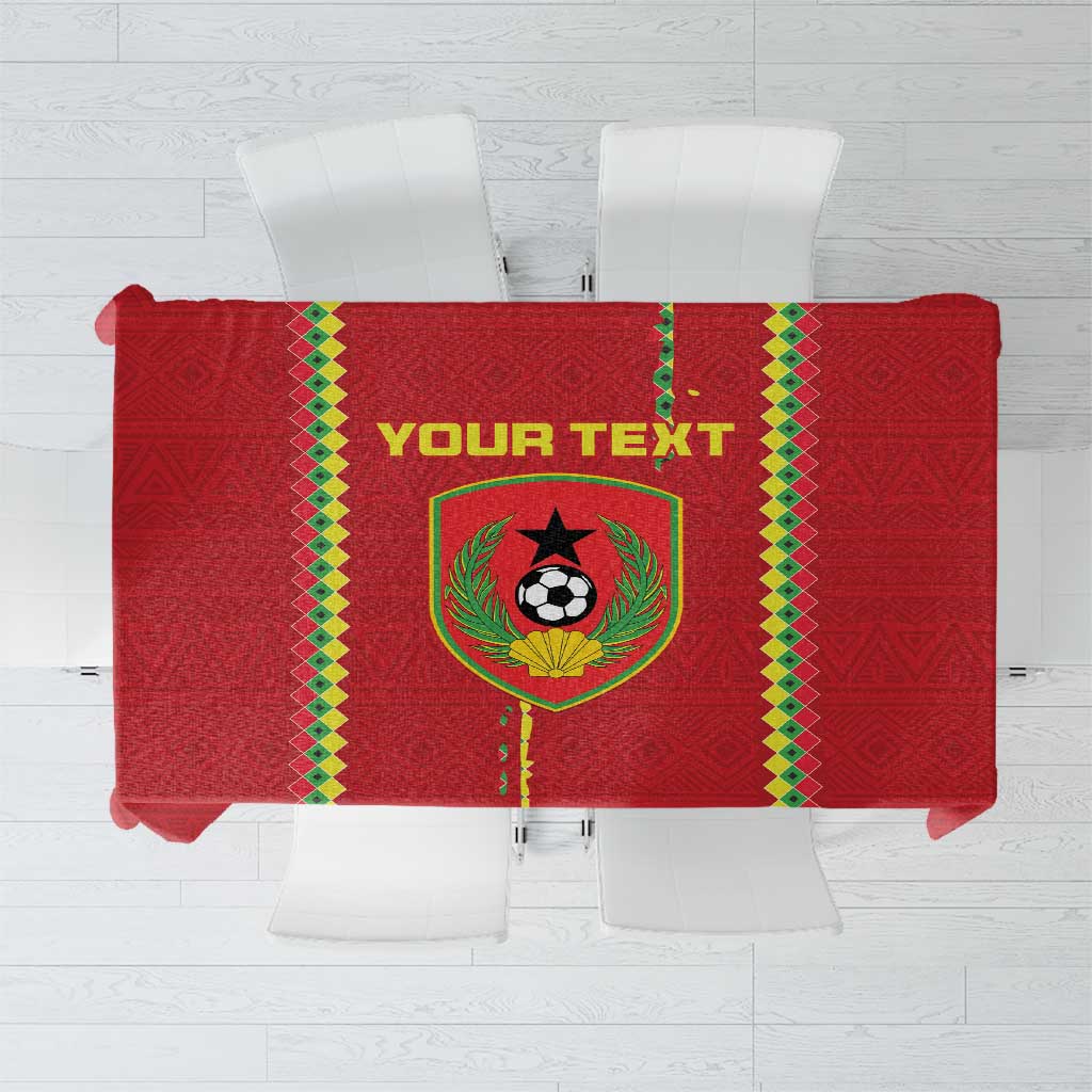 Red football tablecloth with green and yellow border and central team emblem