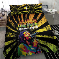 Black duvet cover set with yellow-green radial stripes and Bob Marley singing portrait; 2 pillows.