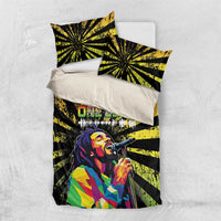 Black duvet cover set with yellow-green sunburst stripes and Bob Marley portrait; 2 matching pillows.