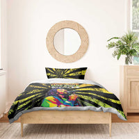 Black duvet cover set with yellow-green sunburst stripes and Bob Marley portrait on bed; 2 pillows.