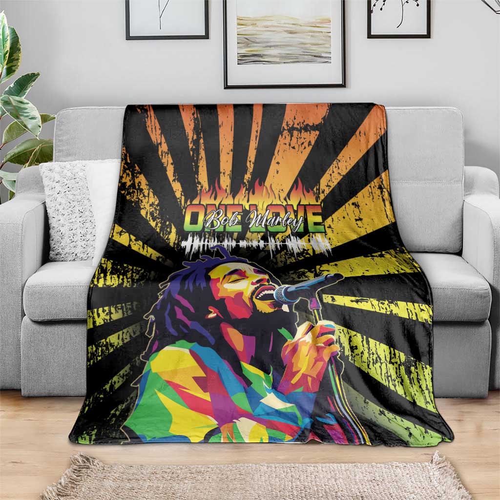Bob Marley grunge style blanket draped on sofa, black/yellow rays with colorful portrait mic