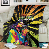 Bob Marley grunge style blanket over couch back, black with yellow rays and portrait mic