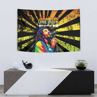 Wall-hanging tapestry with black, yellow, and orange sunburst rays around colorful singer face