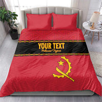Red bedding set with two pillows, black 'YOUR TEXT' band and yellow Angola crest emblem