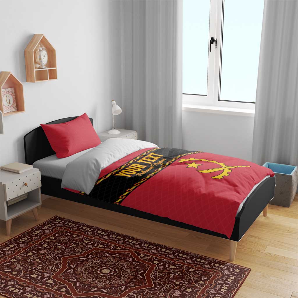 Red duvet and pillow set with black 'YOUR TEXT' band and yellow Angola crest