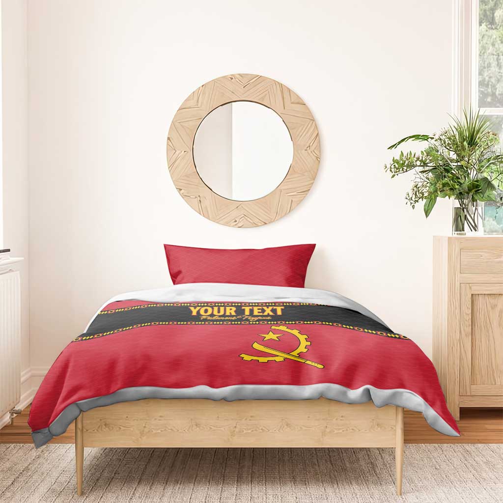 Red bedding set with yellow Angola crest, 'YOUR TEXT' stripe, and gray border trim