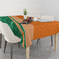 Orange and green elephant tablecloth with diagonal stripe trim and leaf band