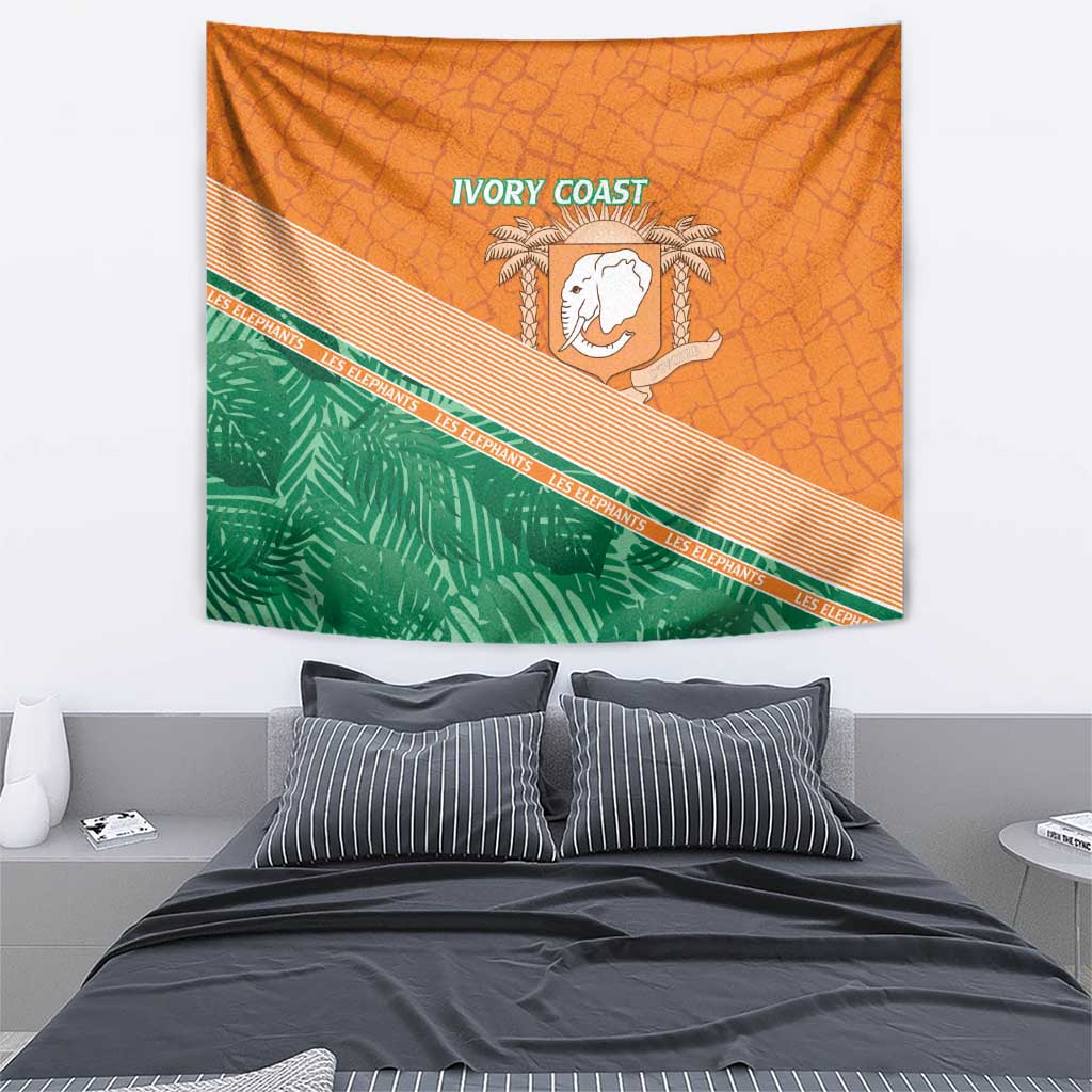 Orange wall tapestry with green foliage band, white elephant emblem, and 'IVORY COAST' title.